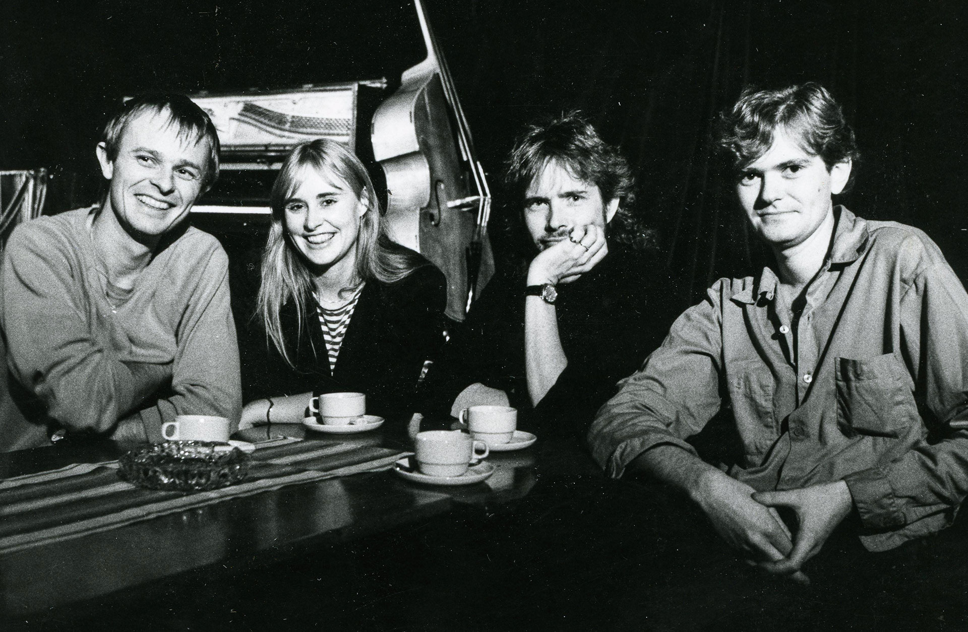 Bild på bandmedlemmarna från 1980-talet.